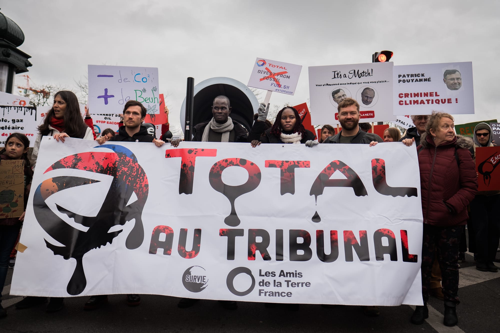 Ugandan activists against EACOP at a climate march in Paris, France, in 2022